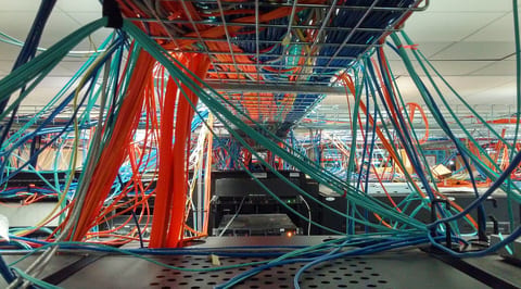 Network cables running through ceiling cable trays